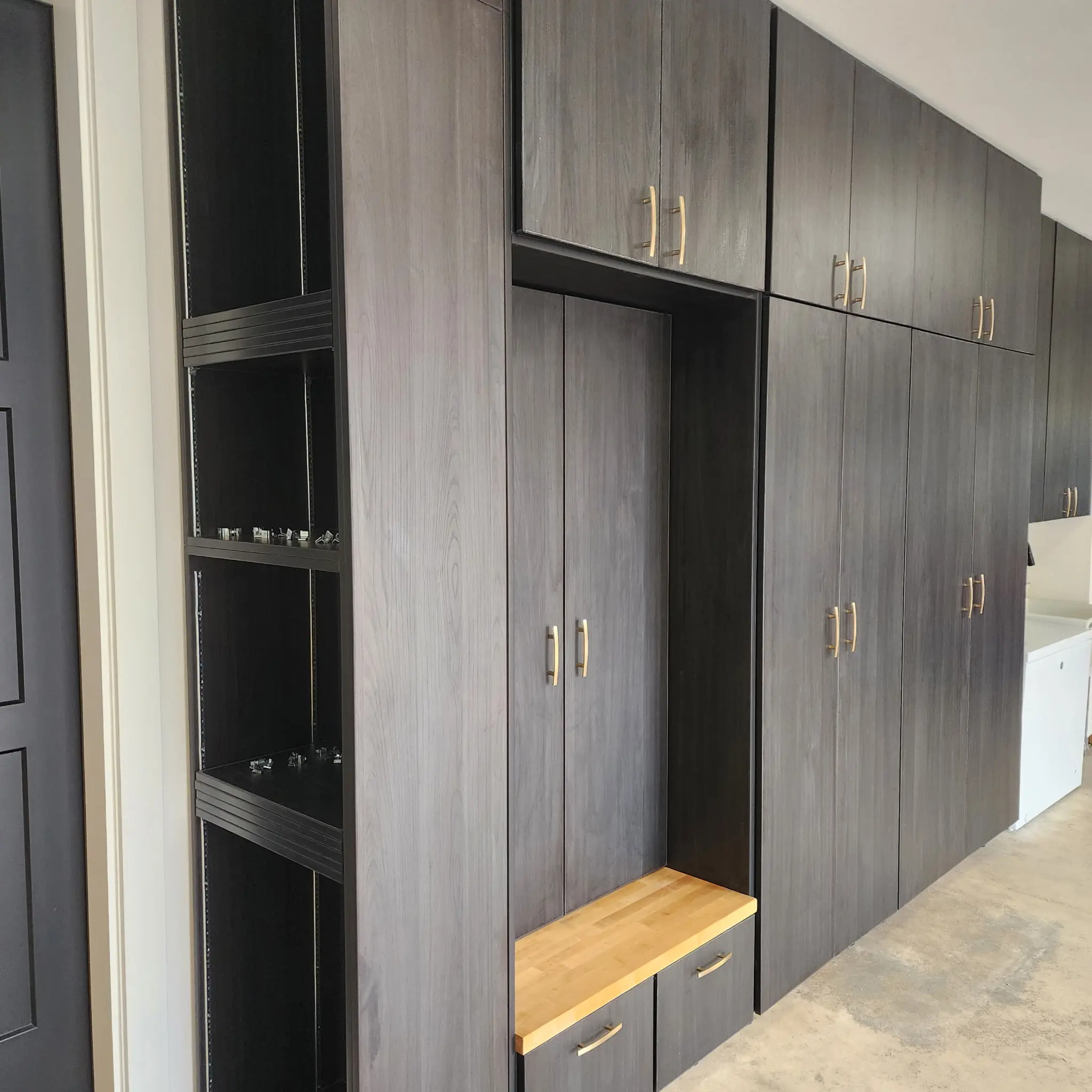 How to Design the Ultimate Garage Storage System in Camas, WA: Cabinets, Workbenches & Overhead Storage